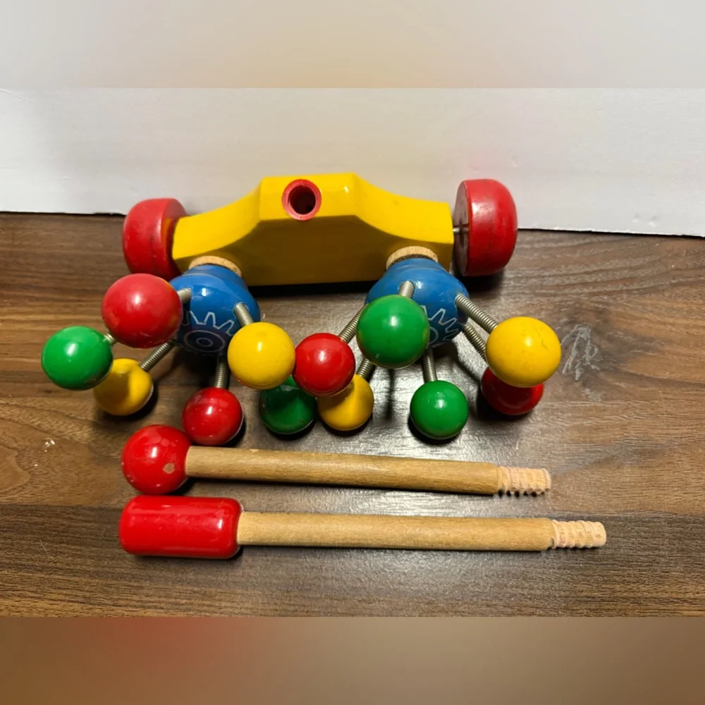 Very Rare vintage Kouvalias Vibrant Wooden Toy with Red, Yellow, Green, and Blue